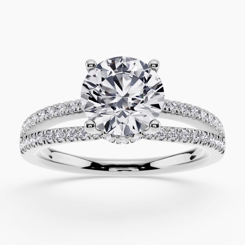 Image 49: Hidden halo engagement ring with diamonds under the center stone