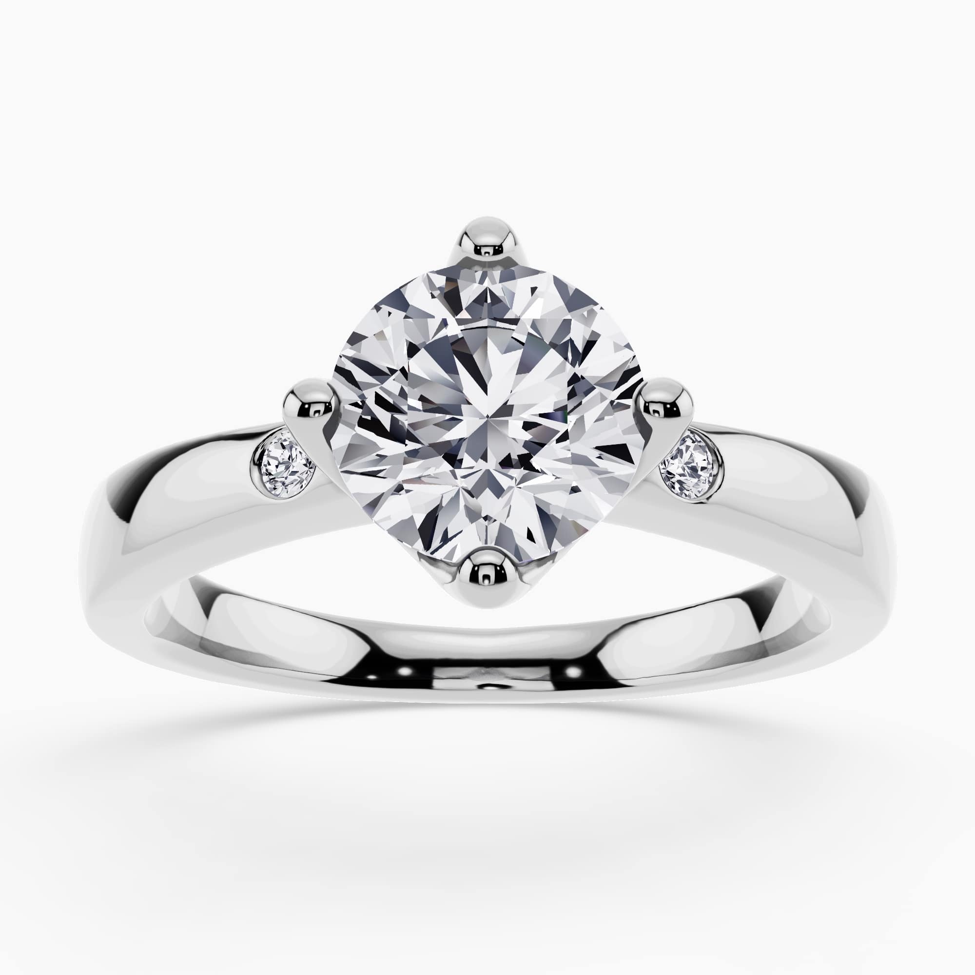 Image 43: Three-stone ring with a trio of round-cut diamonds