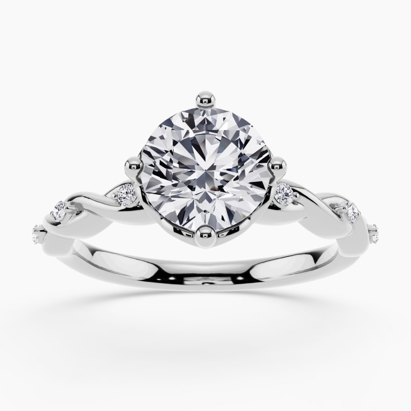 Image 47: Twisted-band engagement ring with a single brilliant diamond